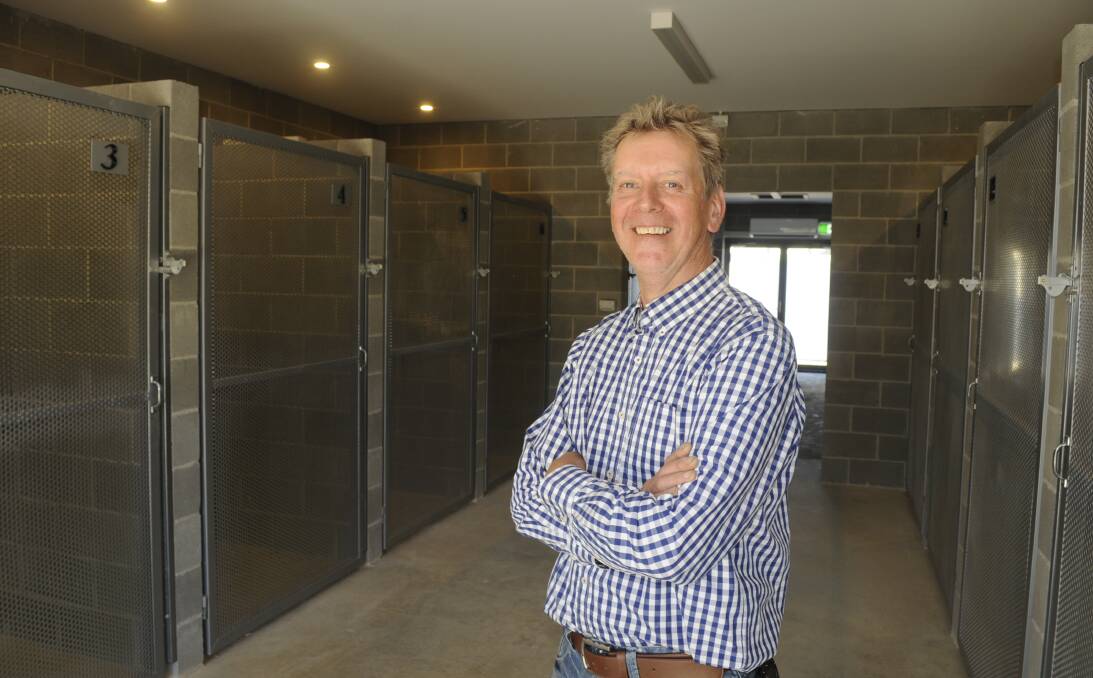 FINALLY OPEN: The battle for Brendan McHugh to open a dog and cat boarding kennel has taken almost three years, but on Thursday the Dunkeld Park Pet Hotel finally opened for business. Photo:CHRIS SEABROOK 110216ckennls1