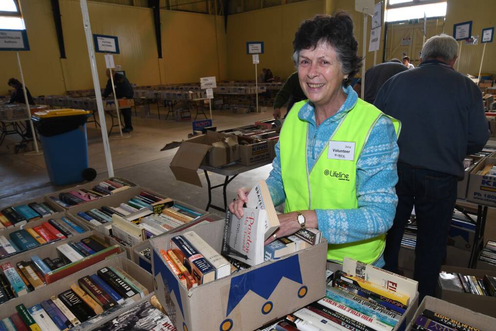 SUCCESS: Jane Talbot was among a host of volunteers at the weekend's fundraising book fair for Lifeline Central West. Photo: CHRIS SEABROOK 052018cbooks10