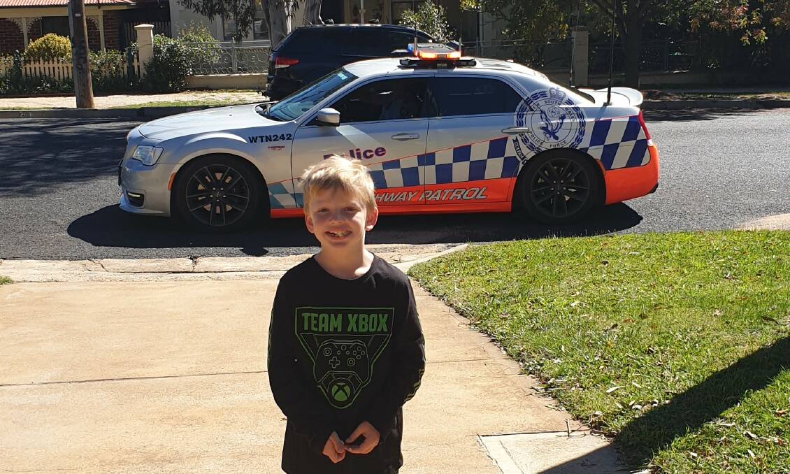 CELEBRATION: Bathurst police were among those to swing by outside Karmichael Fosteris' house to say happy birthday. Photo: SUPPLIED