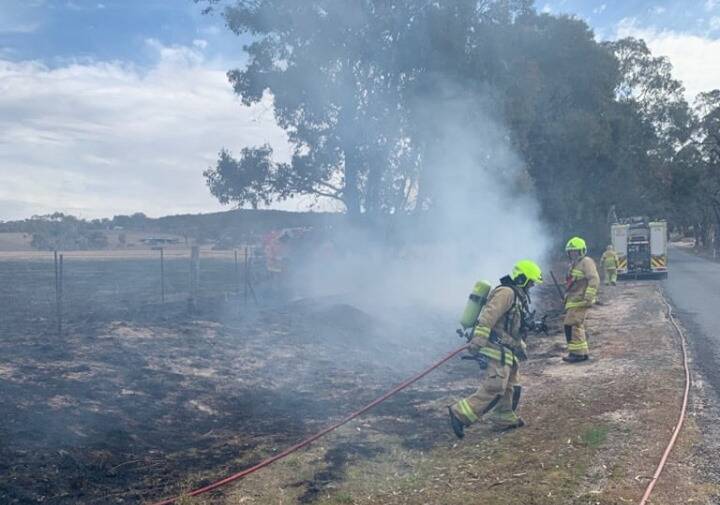 BLAZE: An out-of-control grass fire at Rock Forest prompted a multi-agency response on Thursday afternoon. Photo: FRNSW BATHURST