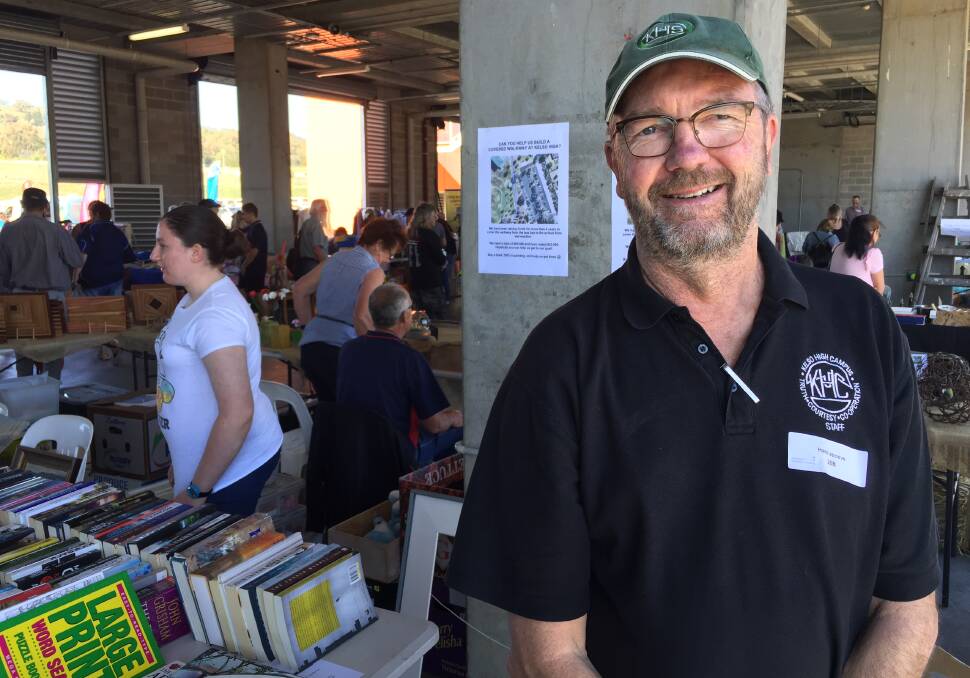 COVER NEEDED: Denison College Kelso High Campus teacher Hans Stroeve is working to raise funds for the school at the recent Mount Panorama Community Garage Sale. Photo: NADINE MORTON 121017nmwalkway1