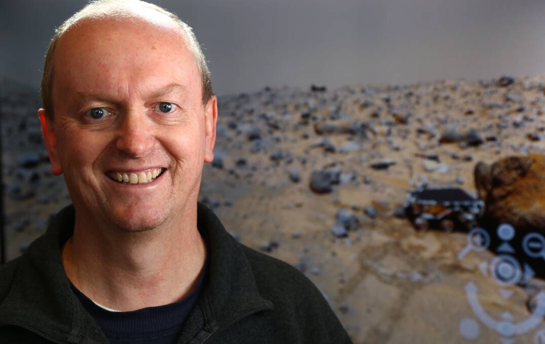 SPACE TALK: There was standing room only during astronomer Ray Pickard's sold-out talk about the Red Planet. Photo: PHIL BLATCH 062418pbmars5