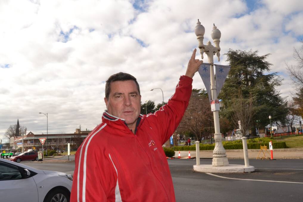 Bathurst Regional councillor Warren Abuin says Essential Energy needs to fix the high number of street lights not working across the CBD before the winter festival kicks off. Photo: NADINE MORTON 070518nmlight1