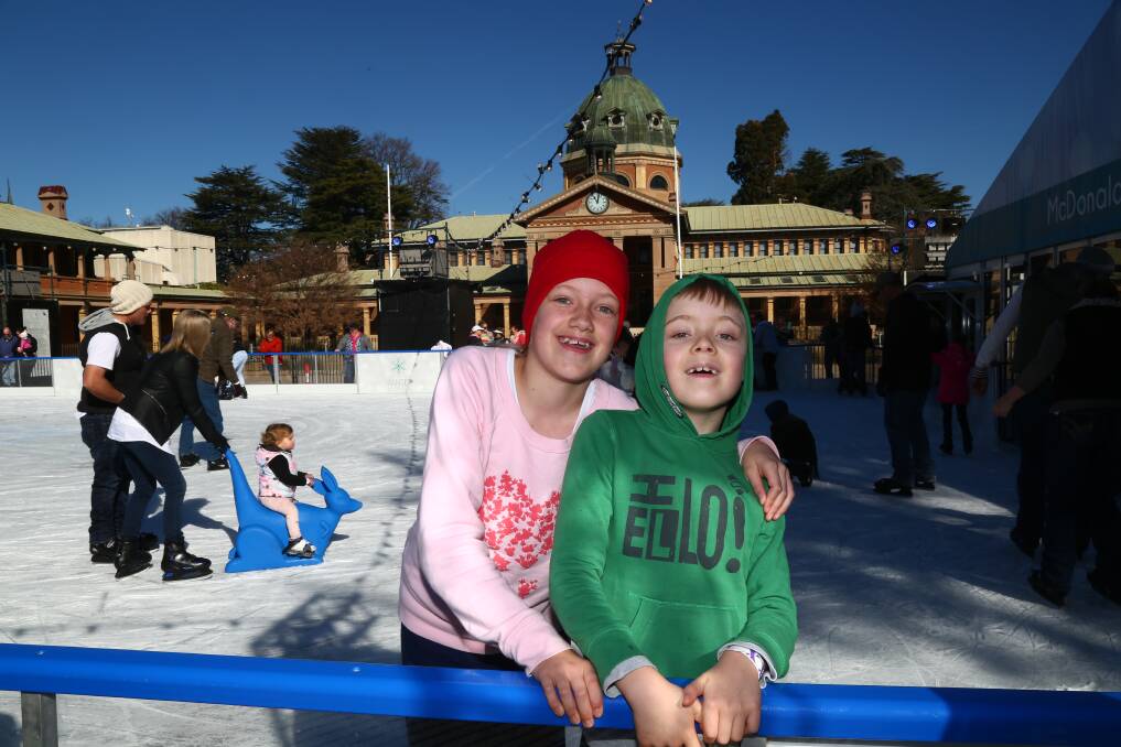 FESTIVAL OF FUN: Zoe and Simon Van Veenendaal were among thousands of people who ice skated during last year's festival. Photo: PHIL BLATCH 070217pbskate2