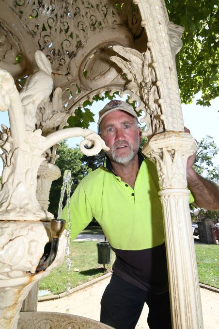 HOT AND COLD: Postie and gardener Ian North thinks he might just have one of the hottest jobs in Bathurst. Photo: CHRIS SEABROOK 011619cnorth