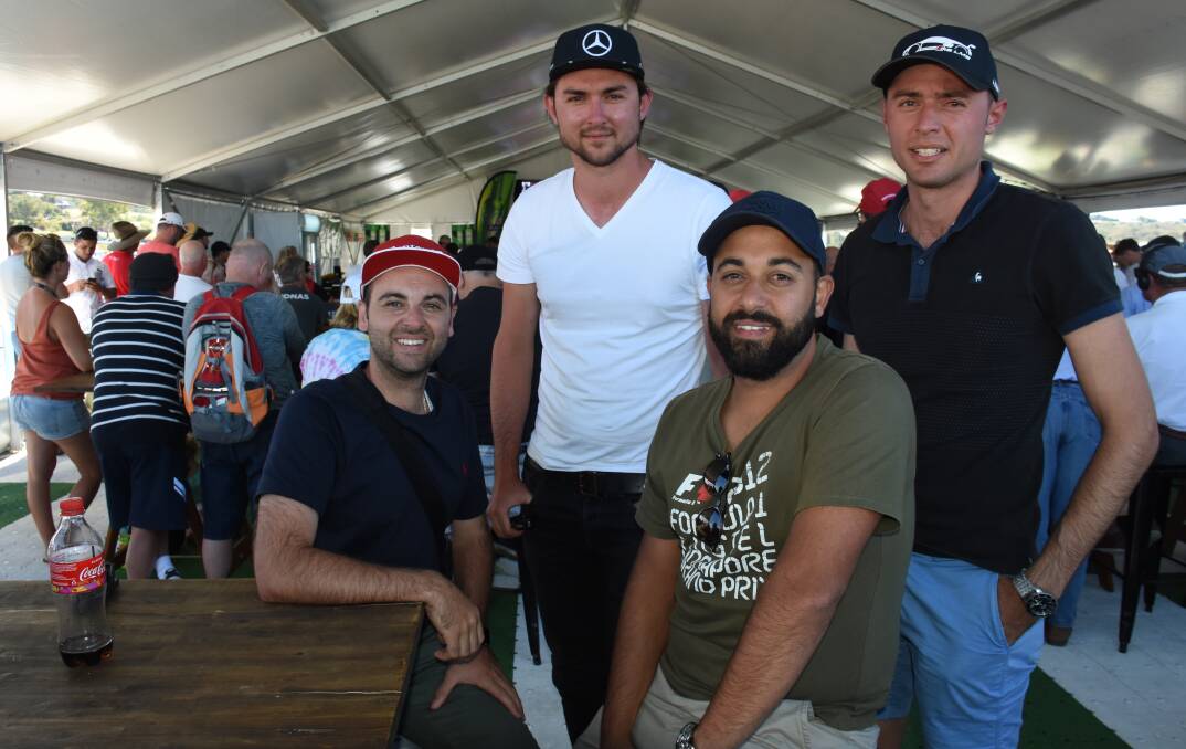 RACE FANS: Michael Caltabiano, Joseph Samardzic, Alex Caltabiano and Simon Samardzicj travelled from Sydney to attend the Bathurst 12 Hour. Photo: NADINE MORTON 020418nmrace29