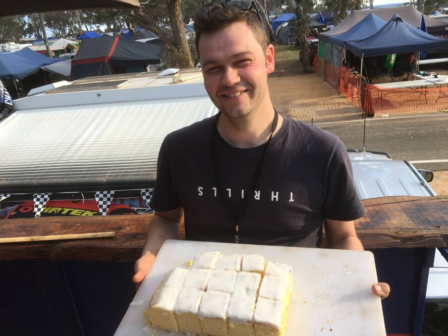 Pastry chef Sam Dorning with the vanilla slices he cooked in a camp oven on top of Mount Panorama. Photo: LUKE WATERS 101119nmthings4