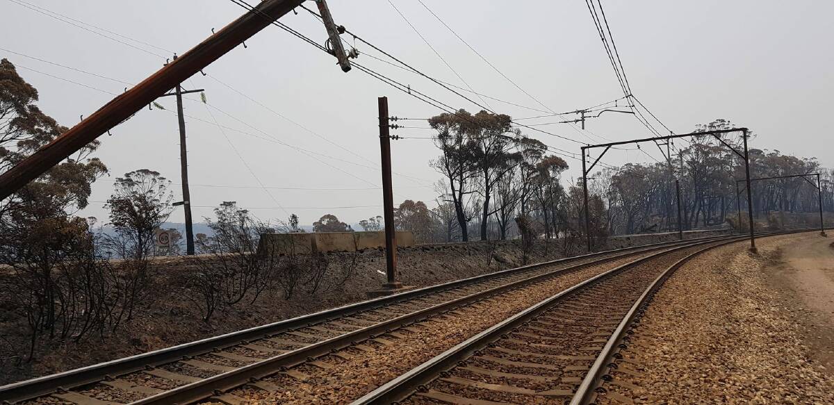 TRACK CLOSED: Bushfire damaged around train lines in the Blue Mountains. Photo: SYDNEY TRAINS 011020fire4