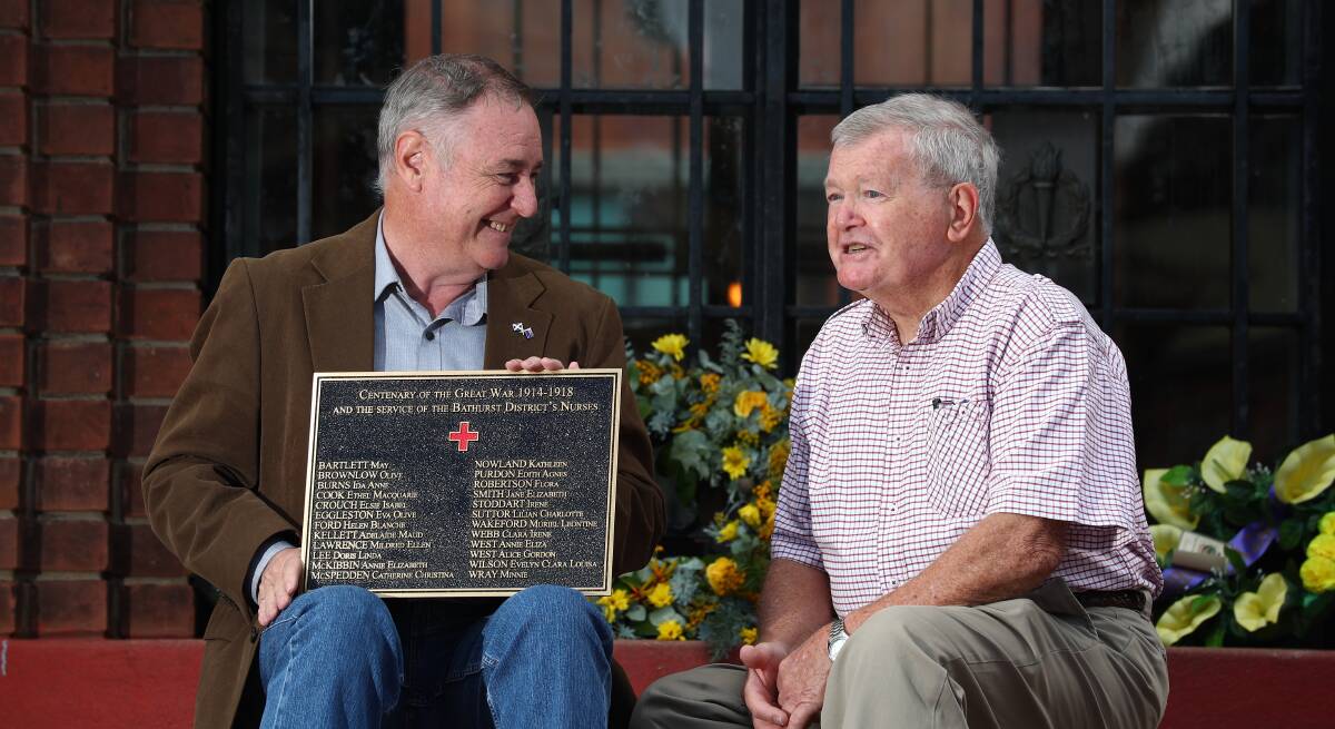IN HONOUR: Bathurst Historical Society military curator Andrew Fletcher and Bathurst RSL Sub Branch president David Mills with the plaque to honour the nurses. Photo: PHIL BLATCH 022018pbnurse2