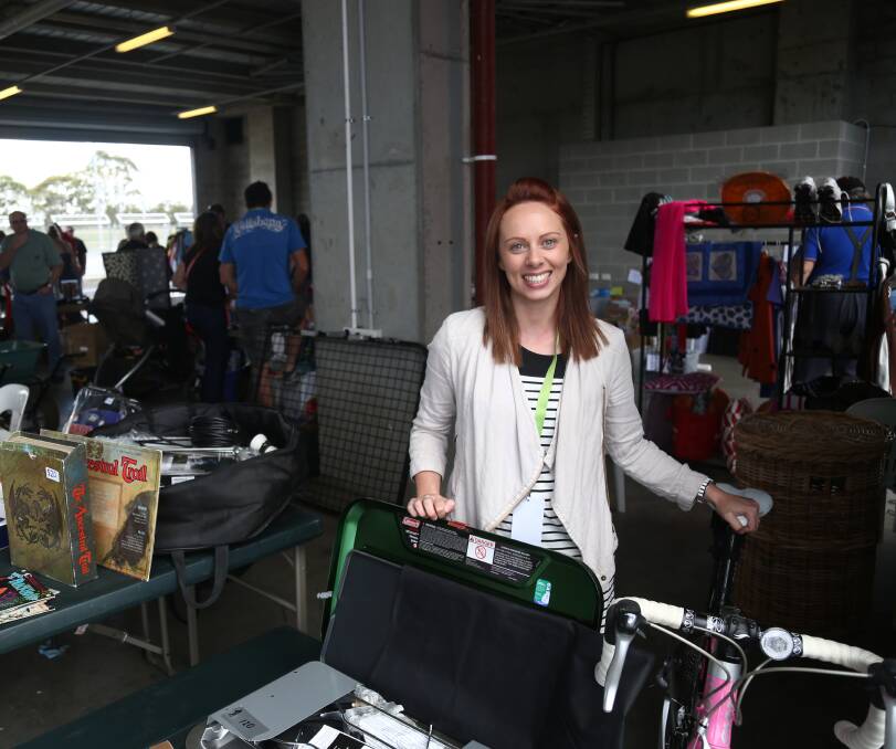 GRAB A BARGAIN: Karen Elms was one of the shoppers at the 2015 Community Garage Sale at Mount Panorama. 112915pbgarage9