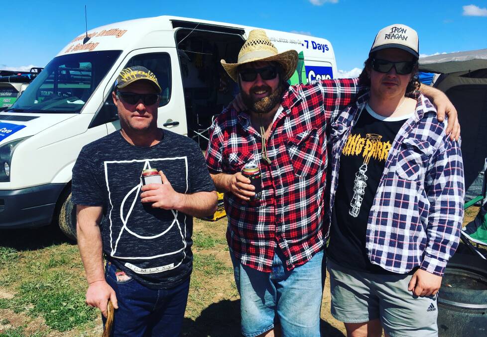 RACE FANS: Scott Greenwood, Scott Wallis and Nicolas Greenwood travelled from Traralgon in Victoria to attend the Bathurst 1000. Photo: NAIDNE MORTON 100618nmfans1