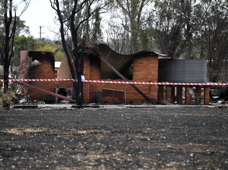 FIRE RAVAGED: The town of Rappville was devastated by the huge 47,790 hectare Busbys Flat bushfire, but Central West firefighters are helping out. 