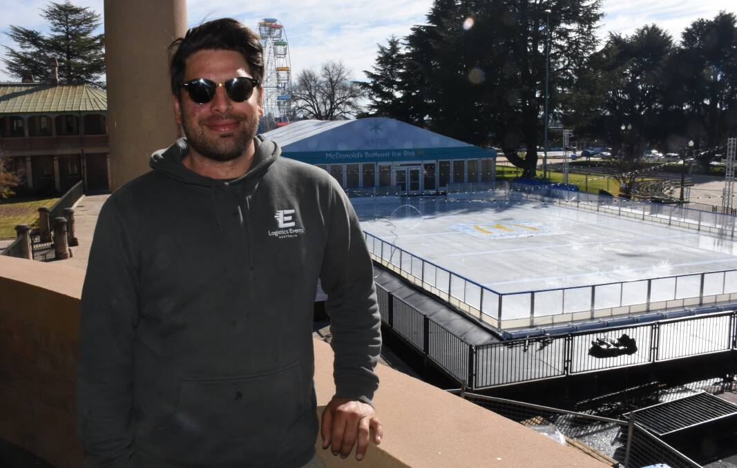 ICY FUN: Ice Rinks Australia's Jamie Stoller is in charge of the crew of eight people who have set up the skating rink for the fourth annual Bathurst Winter Festival. Photo: NADINE MORTON 070418nmice1