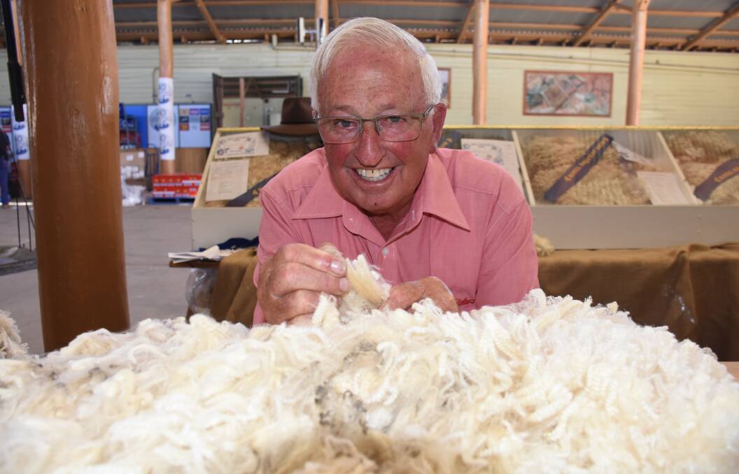 SHEAR THING: Royal Bathurst Show wool judge Trevor Toole has a lifetime of experience in the industry. Photo: NADINE MORTON 041118nmwool1