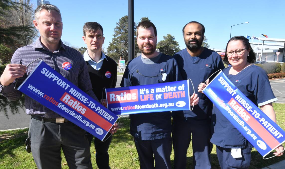 HELP HEEDED: Luke Sanger, Fraser McLennan, Sam Little, Ani Paulose and Sasha Pauline during a rally that was calling on better nurse-to-patient ratios outside Orange Hospital in September 2018. Photo: JUDE KEOGH 0918jknurses3