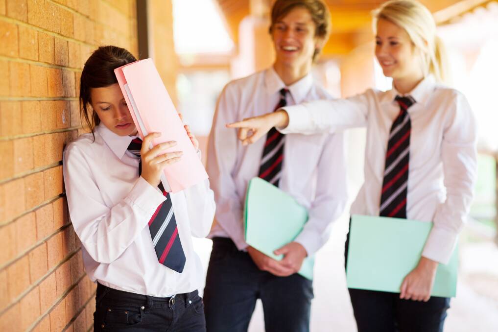 REPORT CARD: Long-time teacher said students' behaviour has not changed, but there are other differences. Photo: SHUTTERSTOCK
