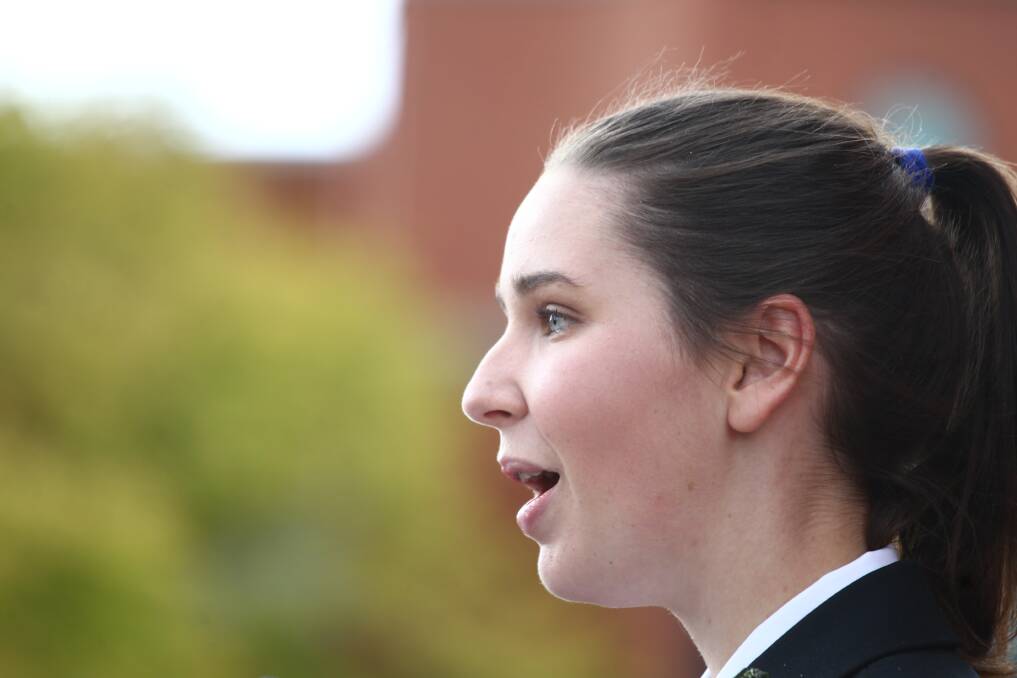 LEST WE FORGET: Denison College Bathurst High campus captain Eve Currie addresses crowd at Anzac Day Commemoration Service. Photo: PHIL BLATCH