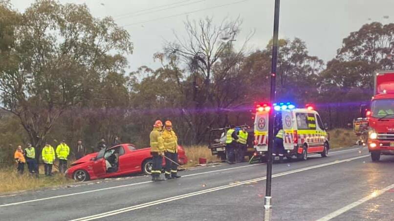 TRAFFIC: Emergency services remain on scene at a two-car crash on the Great Western Highway between Bathurst and Lithgow. Photo: BATHURST SES