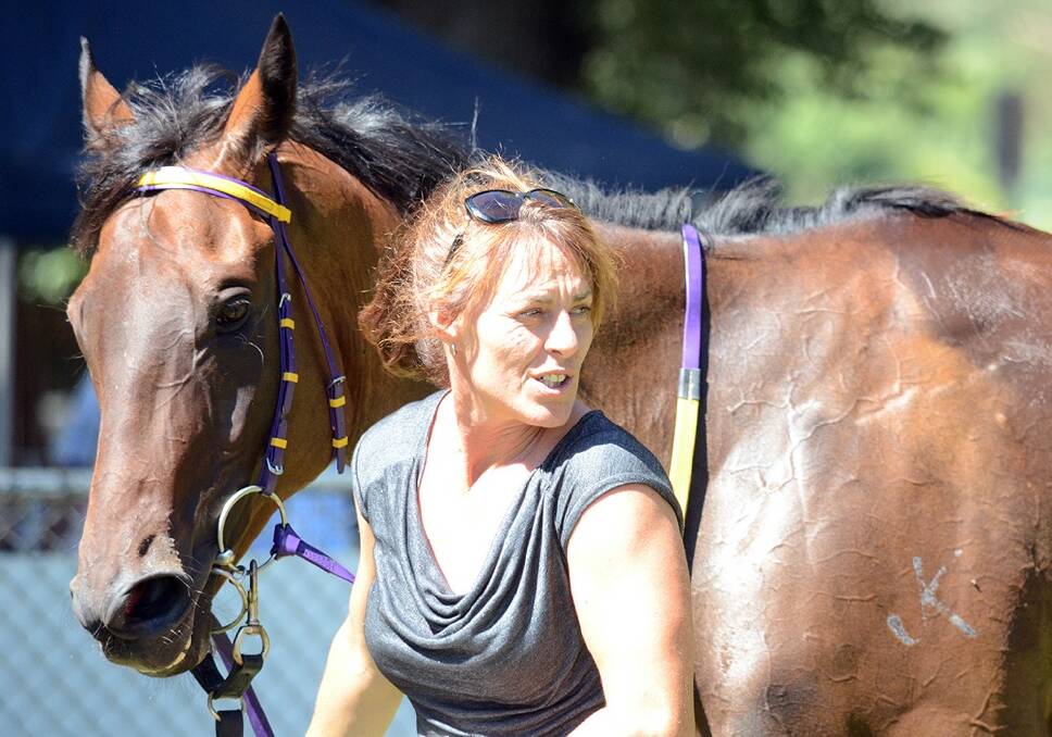 A SPECIAL BOND: Pictured with Son of Spartacus, Maree Hopkins is officially part of the Towac Park family. Photo: TRACKPIX