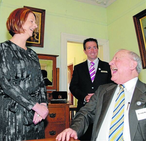 WELCOME TO BATHURST: Prime Minister of Australia Julia Gillard sharing a joke with Bathurst Mayor Paul Toole and former Bathurst Mayor Honourable John Matthews at the Chifley Home. Photo: ZENIO LAPKA. 091810zgillard3