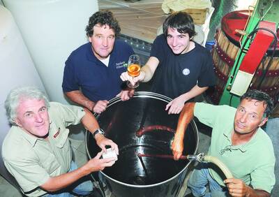 SOMETHING TO CELEBRATE: Vale Creek wines' Tony Hatch, Grass Parrott's Andrew Macarthur, German winemaker in training Benjamin Beth and Renzaglia Wines� Mark Renzaglia are busy preparing the city's first sparkling wine. Photo: CHRIS SEABROOK 030310cvalecrkw1