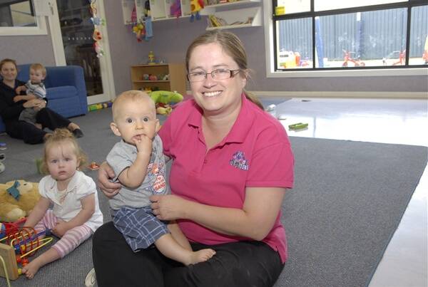 CAPACITY: With a year-long waiting list for the infant rooms at Kelso West ABC Learning Centre, six-month old Finlay McCulloch pictured with centre director Emma Forster  is fortunate to have secured a place. Photo: PHILL MURRAY 011112pemma