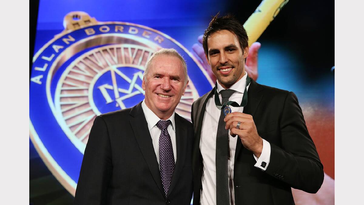 Mitchell Johnson poses with Allan Border after winning the Allan Border Medal on Monday night. Picture GETTY IMAGES