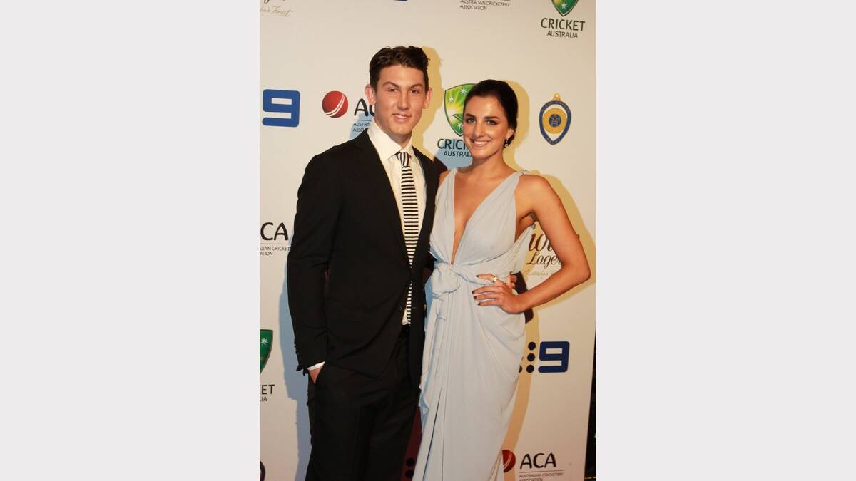 Nic Maddison and Rebecca McLean arrive at the 2014 Allan Border Medal on Monday night. Picture: Ben Rushton 