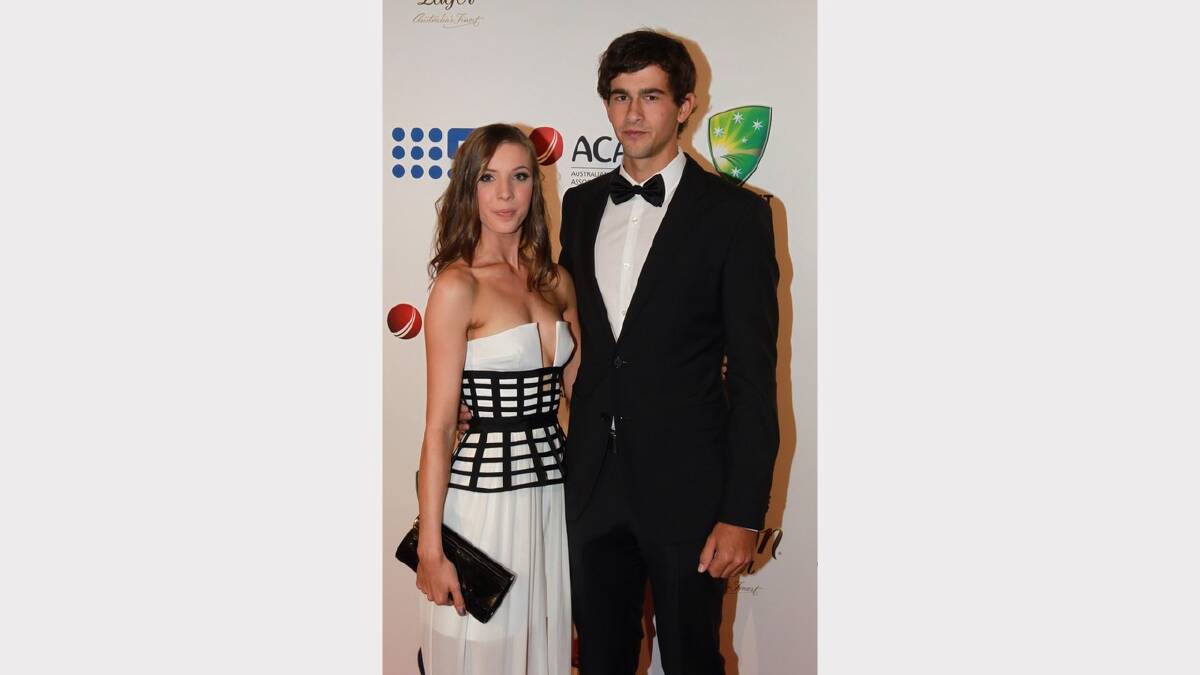 Ashton Agar and Madeline Hay  arrive at the 2014 Allan Border Medal on Monday night. Picture: Ben Rushton 