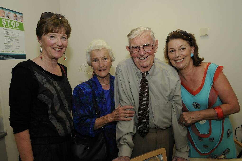 SNAPPED: Brian and Mim Bainbridge with their daughters Carol and Judy at St Vincent's Christmas party. 121213pvinnies  