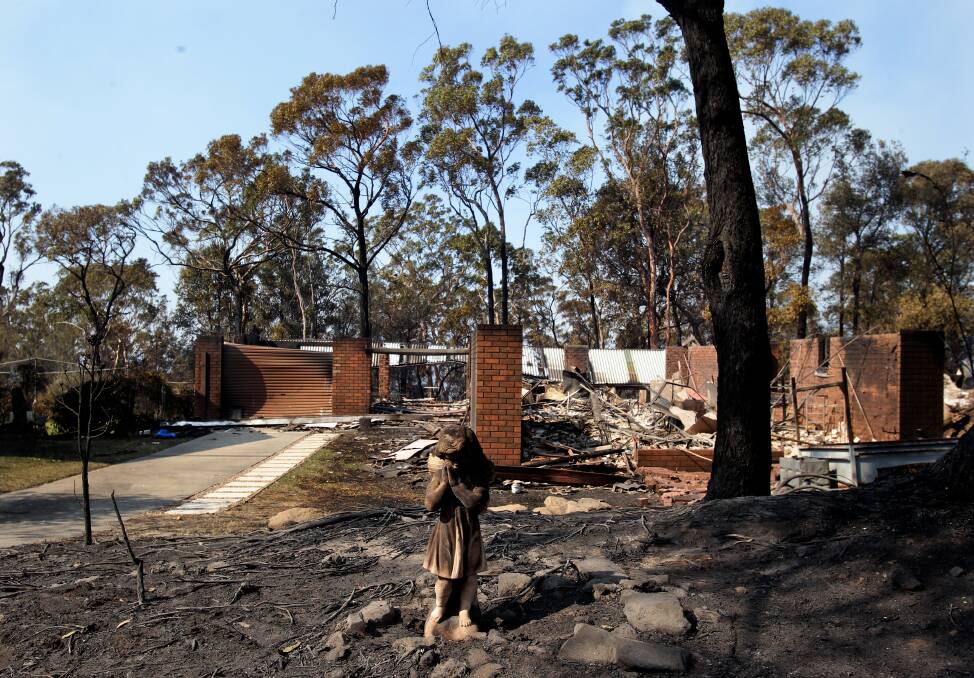 SUCH LOSS: The aftermath of the bushfires that devastated homes in Buena Vista Road, Winmalee, in the Blue Mountains. Photo: Dallas Kilponen.