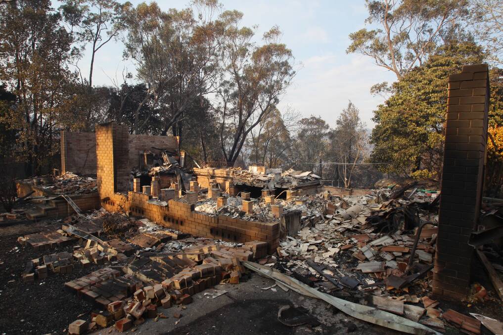 RUIN: The aftermath of the bushfires that devastated homes in Buena Vista Road, Winmalee, in the Blue Mountains. Photo: Dallas Kilponen.