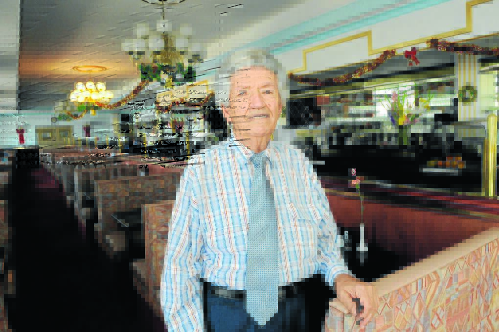 OPEN AGAIN: George Kamaratos is back in business at the Acropole Restaurant, a Bathurst icon. Photo: PHILL MURRAY 	011113pgeorge1