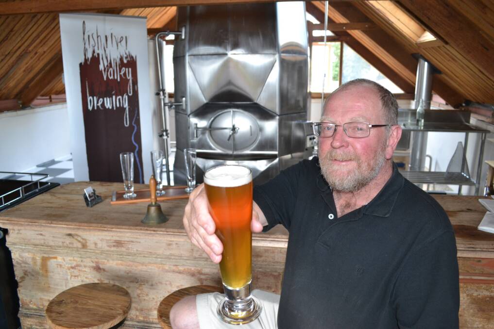 CHEERS TO BEERS: Mick Hoban toasts his new venture, boutique brewery Fish River Valley Brewing. Photo: CHRIS SEABROOK	032713cbrewer