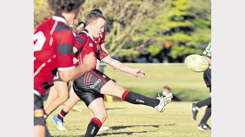 2011: Matt Toole kicks ahead for Dubbo Senior College in their 38-4 rugby league win over Orange High School. The overall winning margin of 102 gave Dubbo their fourth victory in the past five years.