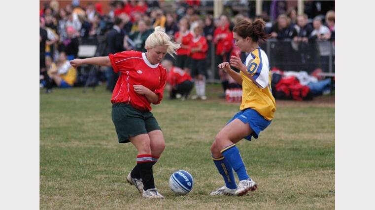 2008: Sarah Kennedy battles with a Bathurst High opponent during the girls soccer. The girls lost 3-0 as Bathurst rallied to keep themselves in with a chance of winning the opening Astley Cup tie.