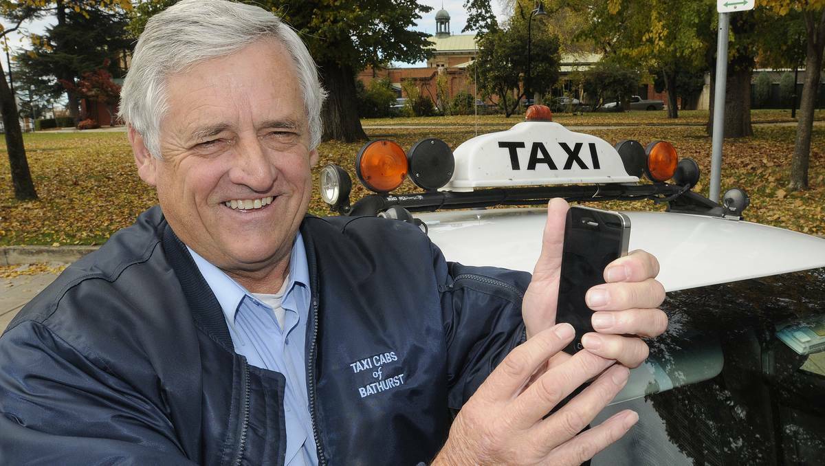 BATHURST:  Bathurst taxi driver Steve Evens has welcomed a new app that utilises a smart phone’s GPS to help people hail a cab and monitor the progress of their request. Photo: CHRIS SEABROOK 052113ctaxis1