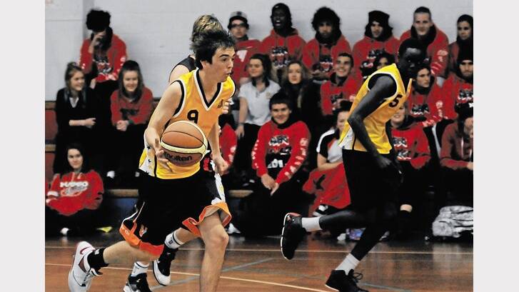 2012: Zac Osborne-Gillette, Orange High School’s Astley Cup boys’ basketball captain, runs up-court. Photo: BELINDA SOOLE