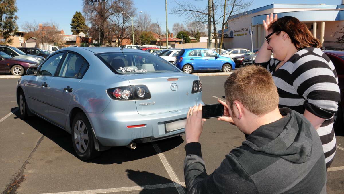 Bathurst couple Aaron and Cassandra are on the look-out for Bathurst drivers that just can't park. Photo: ZENIO LAPKA 082513zparking