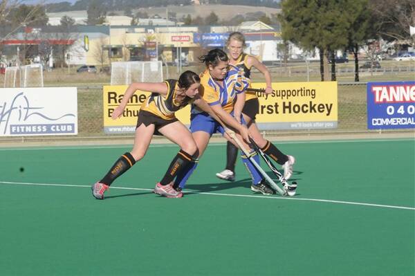 2011: A goal to Bathurst High’s Stephanie White helped her team secure a vital 2-all draw with Orange High in the hockey on day one of their Astley Cup tie. Photo: PHILL MURRAY 061611phoc5