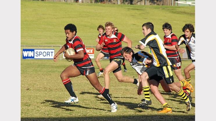 2010: Dubbo College’s David Hoyt breaks away from the Orange High defence in his side’s emphatic win in the Astley Cup rugby league match.