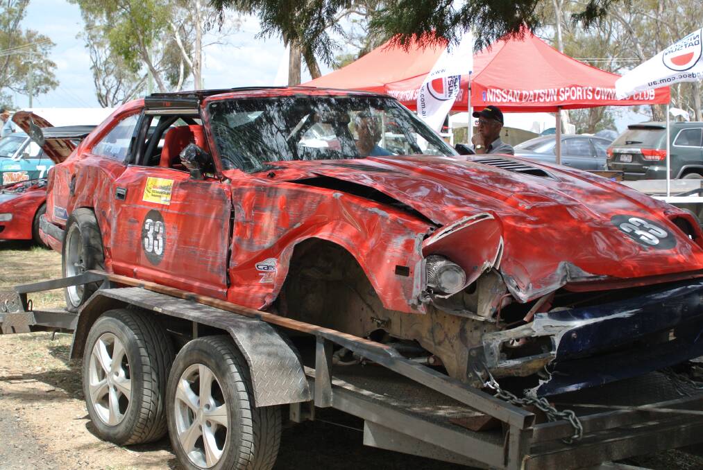 WRITE OFF: The Datsun 280z of Blayney’s Phillip Ryan was heavily damaged when he hit the wall at Sulman Park at the Australian Hillclimb Championships yesterday. Photo: ZENIO LAPKA 	110412zdamage