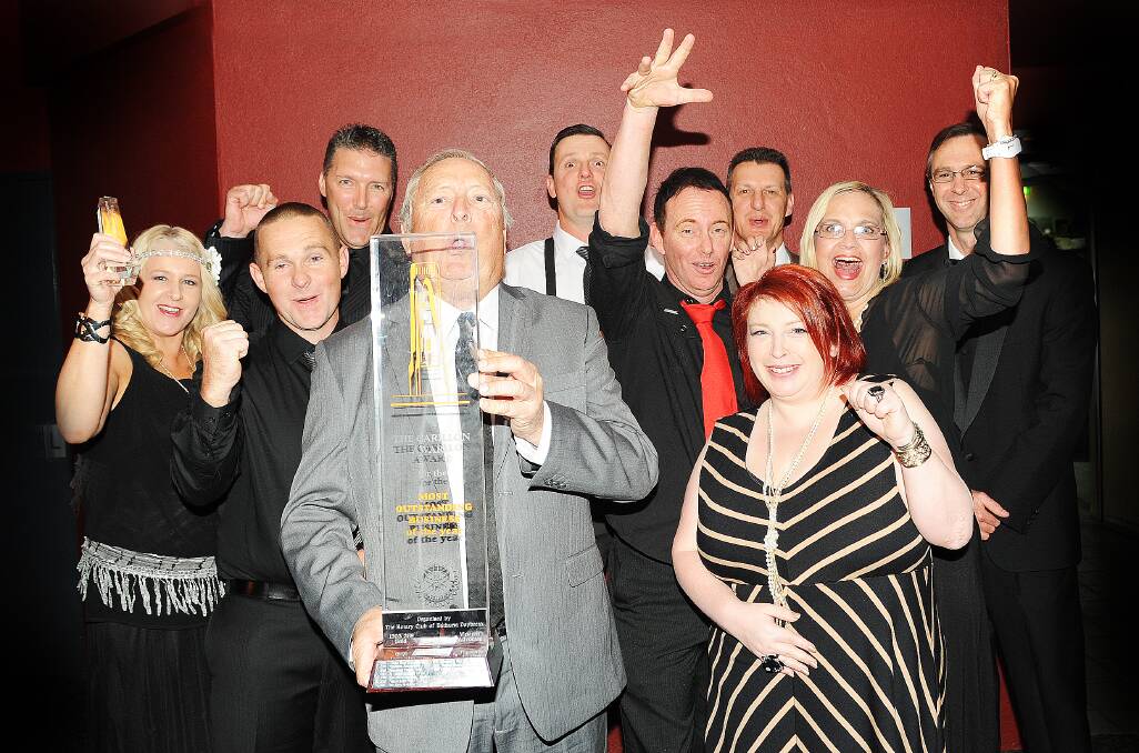 CELEBRATING: Alan Wright with his team from Central Commercial Printers celebrating a big win at the 2013 Crowe Horwath Carillon Business Awards.   092713win17a