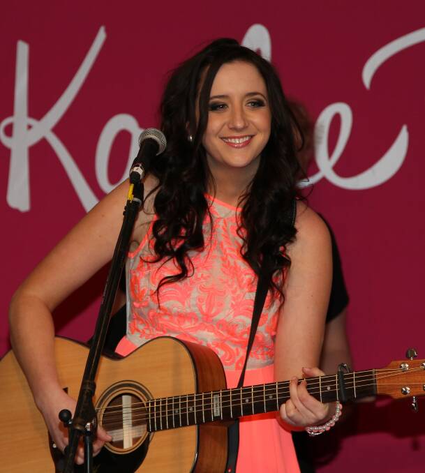 ROCKING THE CHARTS: Country musician and 2013 Toyota Star Maker Kaylee Bell takes to the stage at Tamworth at the official launch of her new album, Heart First. 071713kaylee