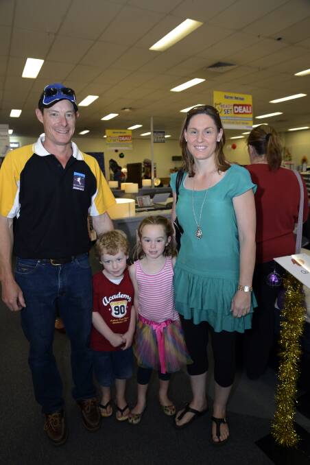 CHRISTMAS AT HARVEY NORMAN: Kevin Price and his wife Kylie with their children Jonathan and Chelsea.