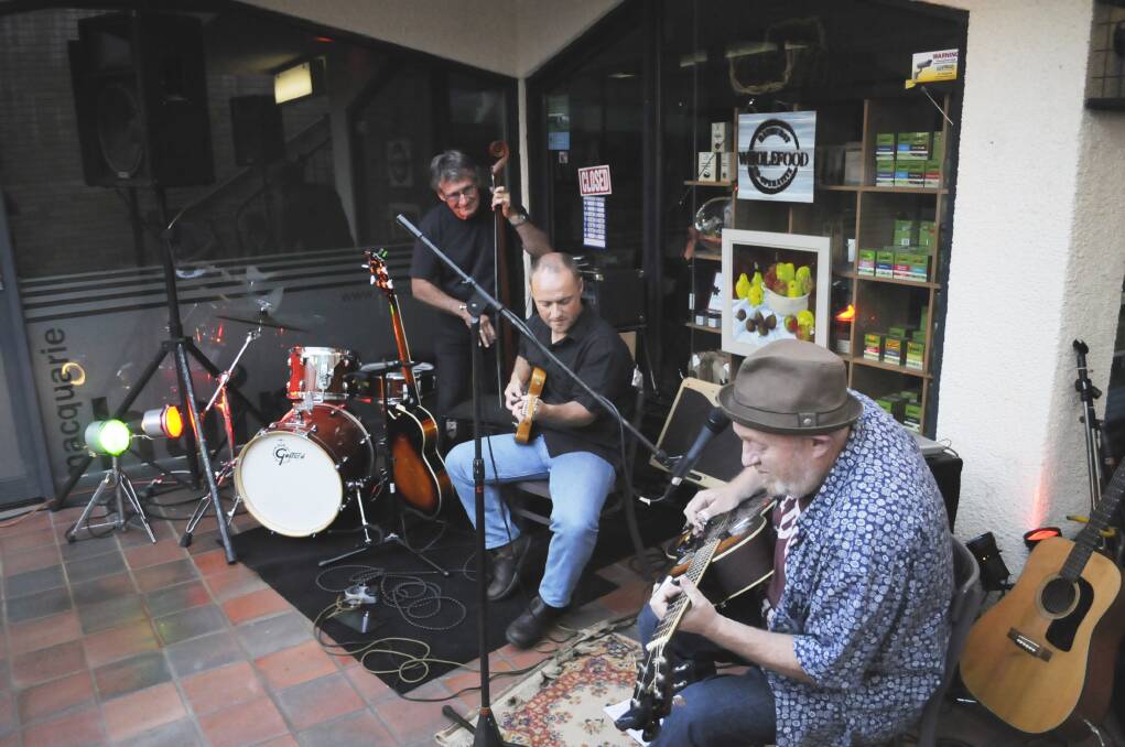 WHOLEFOOD CO-OP POP-UP THEME NIGHT: Members of the Lowdowns entertain the patrons.